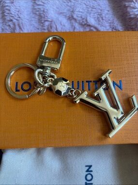 Louis Vuitton Gold Tone LV Initials Key Holder